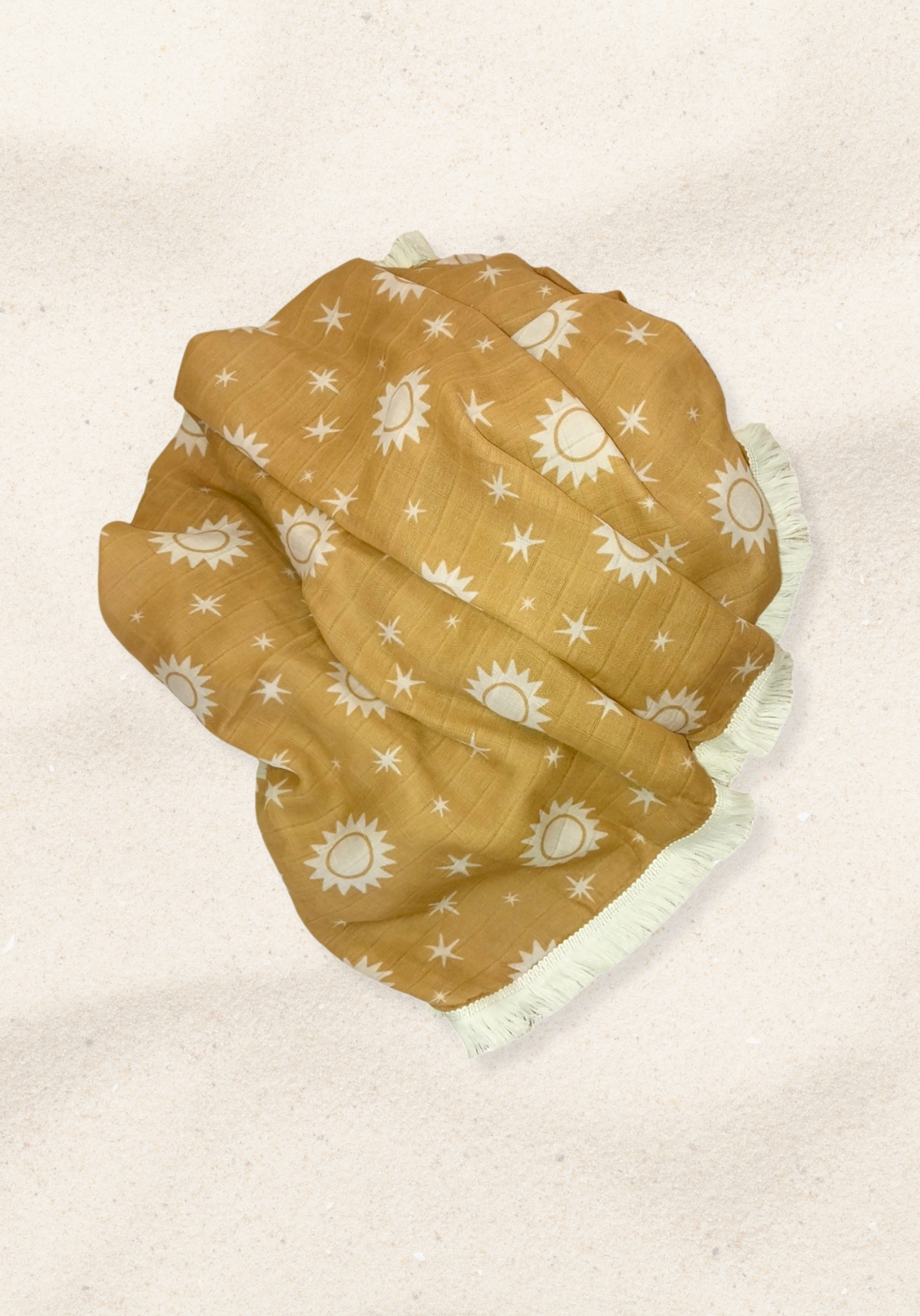 Mustard yellow baby blanket with sun and star print, finished with ivory fringe trim. Lightweight cotton bamboo blend.