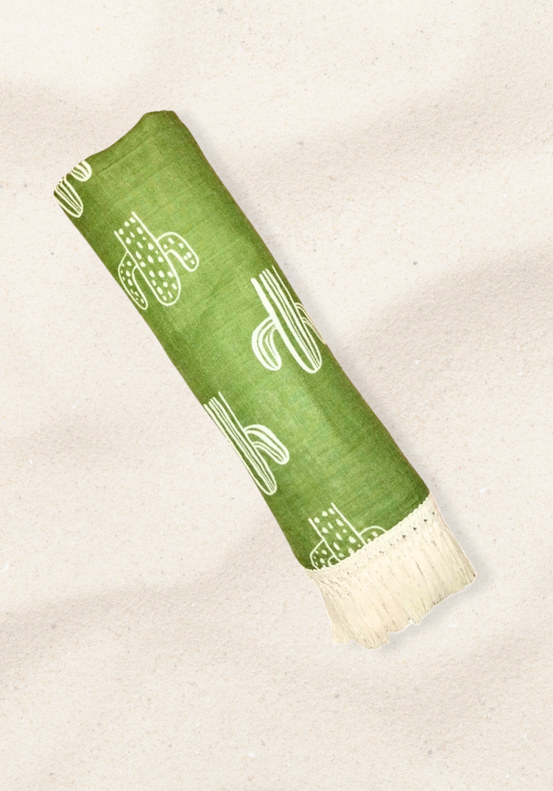 Green cotton baby blanket with white cactus print and cream fringe edges. Soft and breathable fabric.