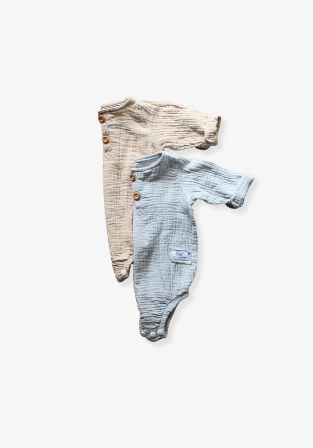 French grey long sleeve baby romper made from soft organic cotton with wooden button front and snap closures.