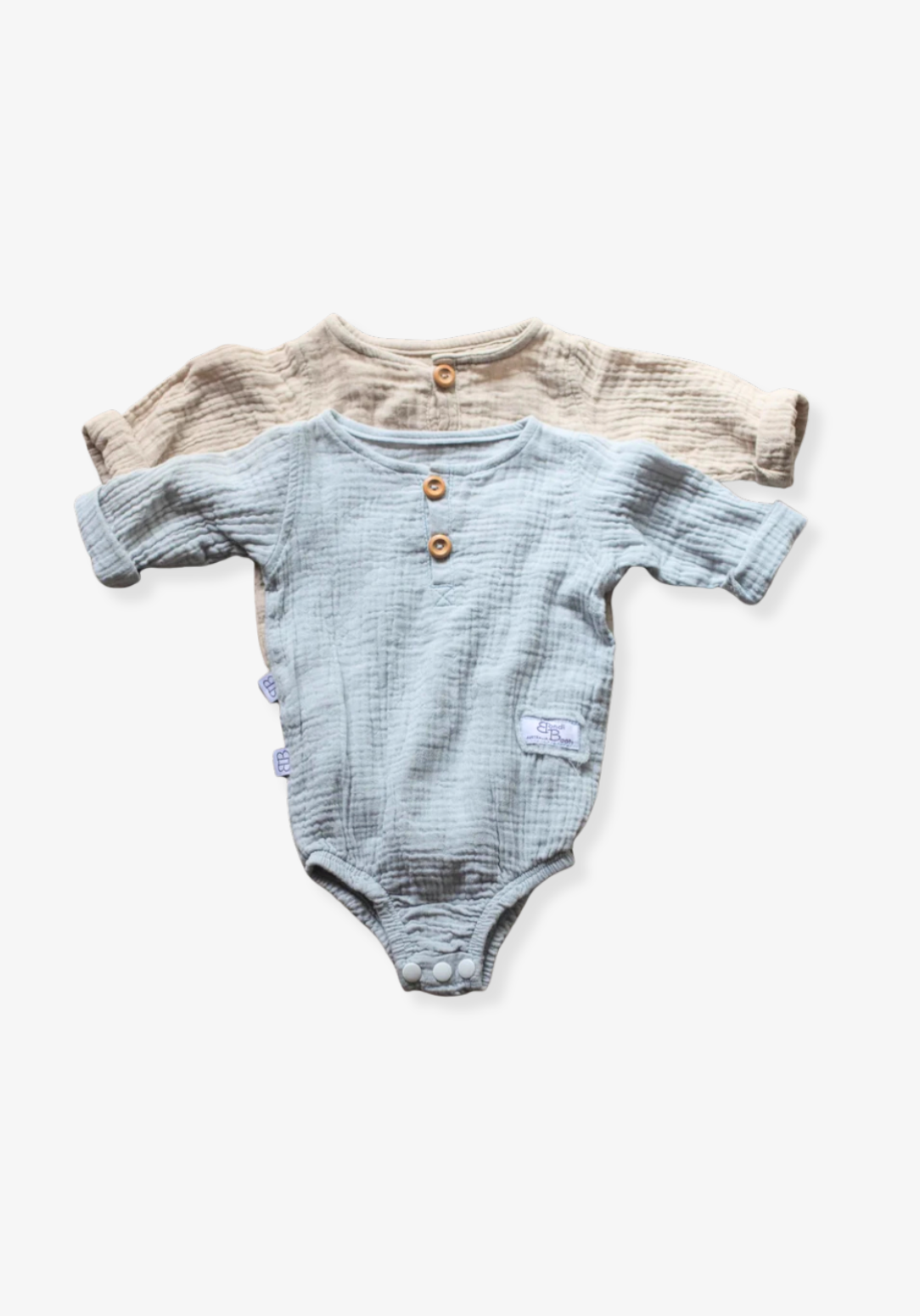 French grey long sleeve baby romper made from soft organic cotton with wooden button front and snap closures.