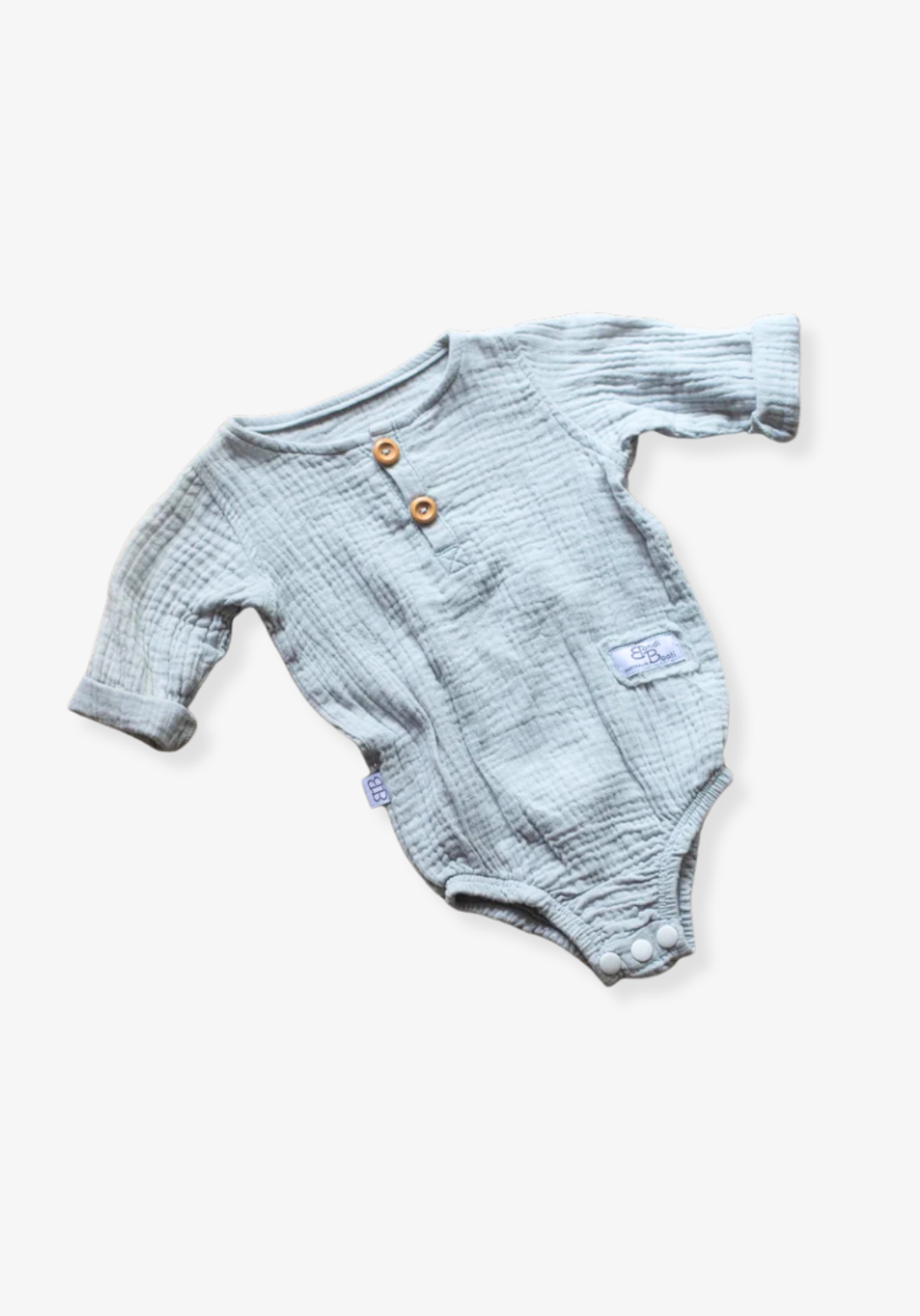 French grey long sleeve baby romper made from soft organic cotton with wooden button front and snap closures.