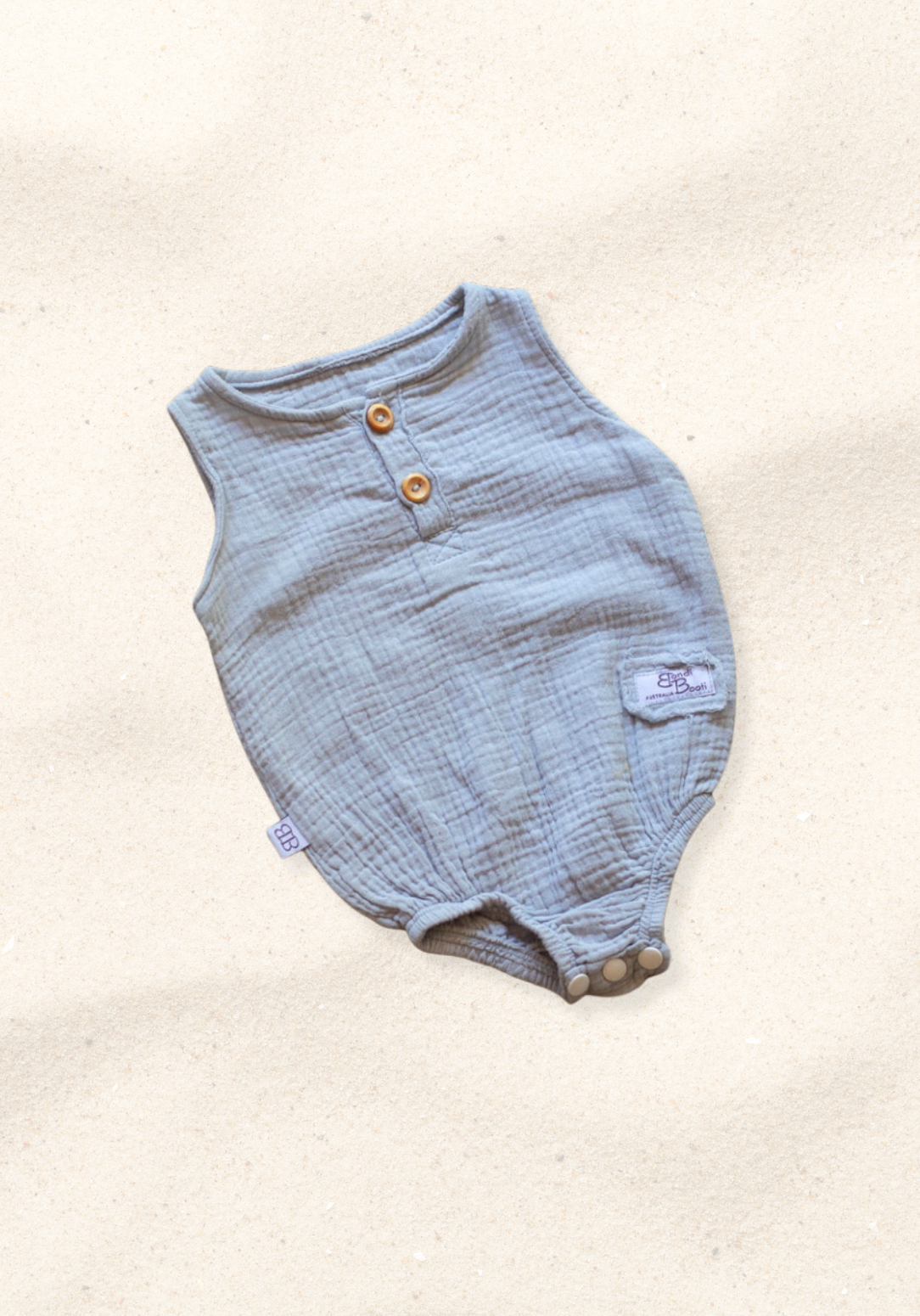 Short sleeve baby romper in French grey made from organic cotton with front buttons