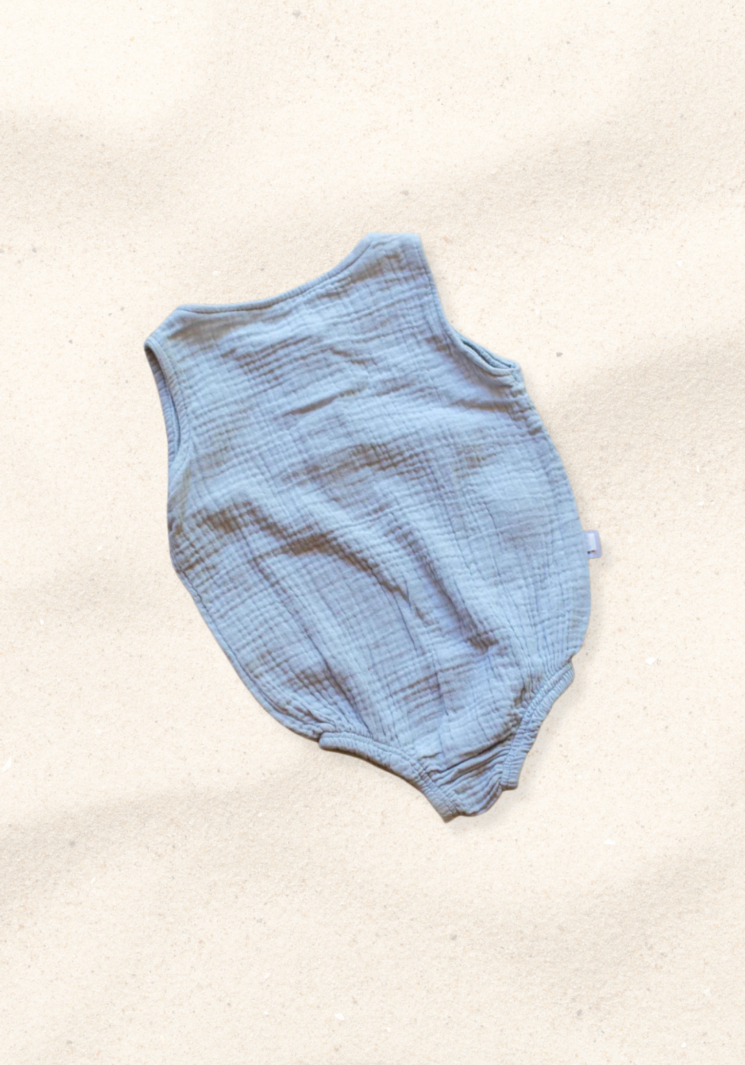 Short sleeve baby romper in French grey made from organic cotton with front buttons
