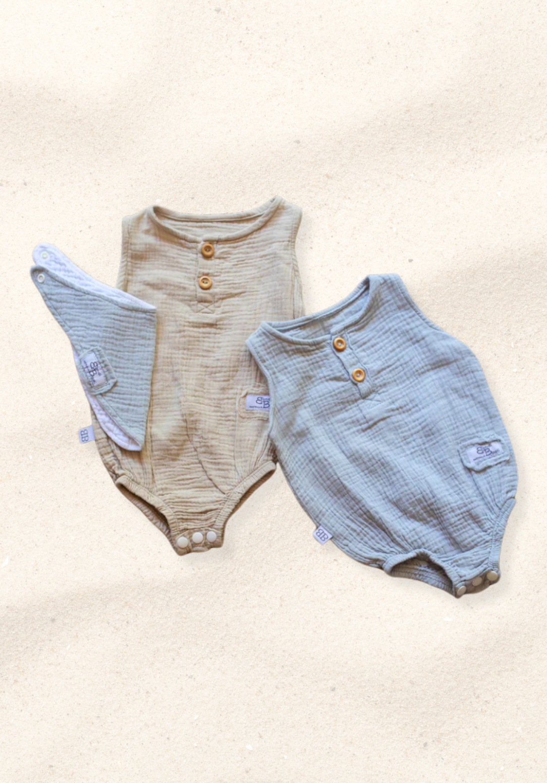 Short sleeve baby romper in French grey made from organic cotton with front buttons