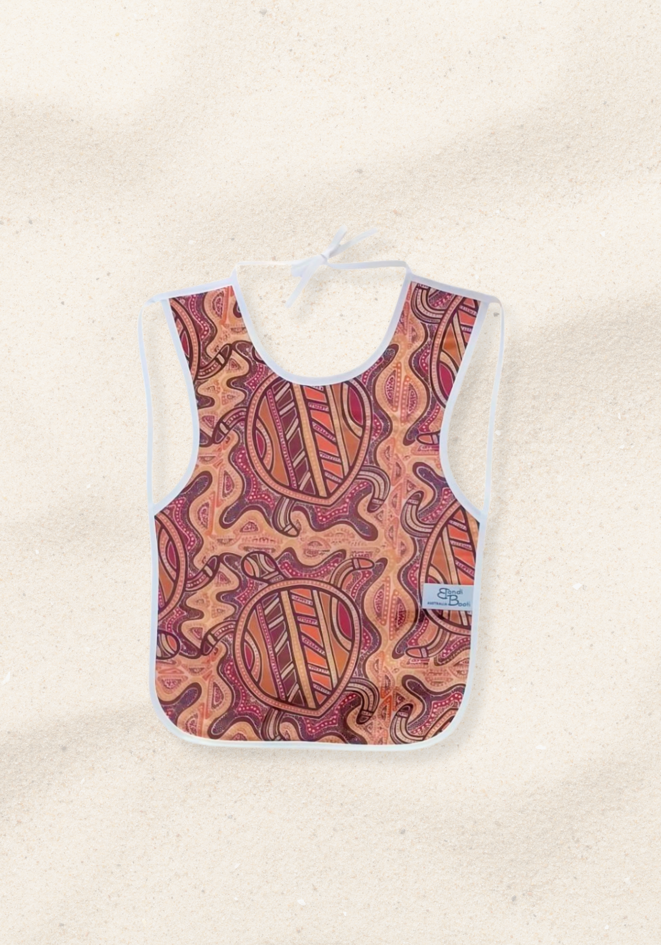 Laminated baby bib with Aboriginal-inspired turtle print