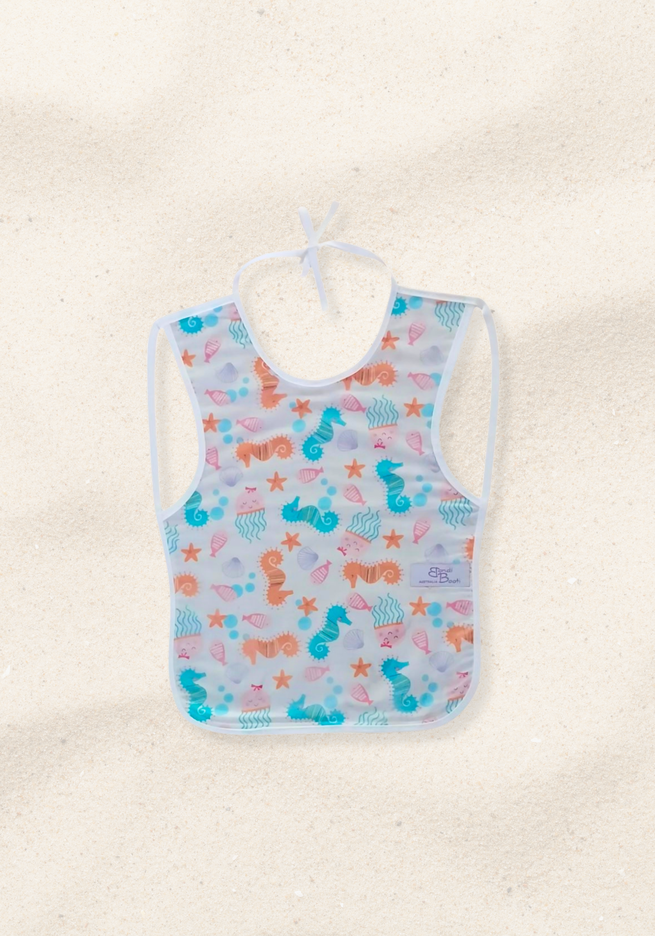 Laminated baby bib with seahorse and seashells design