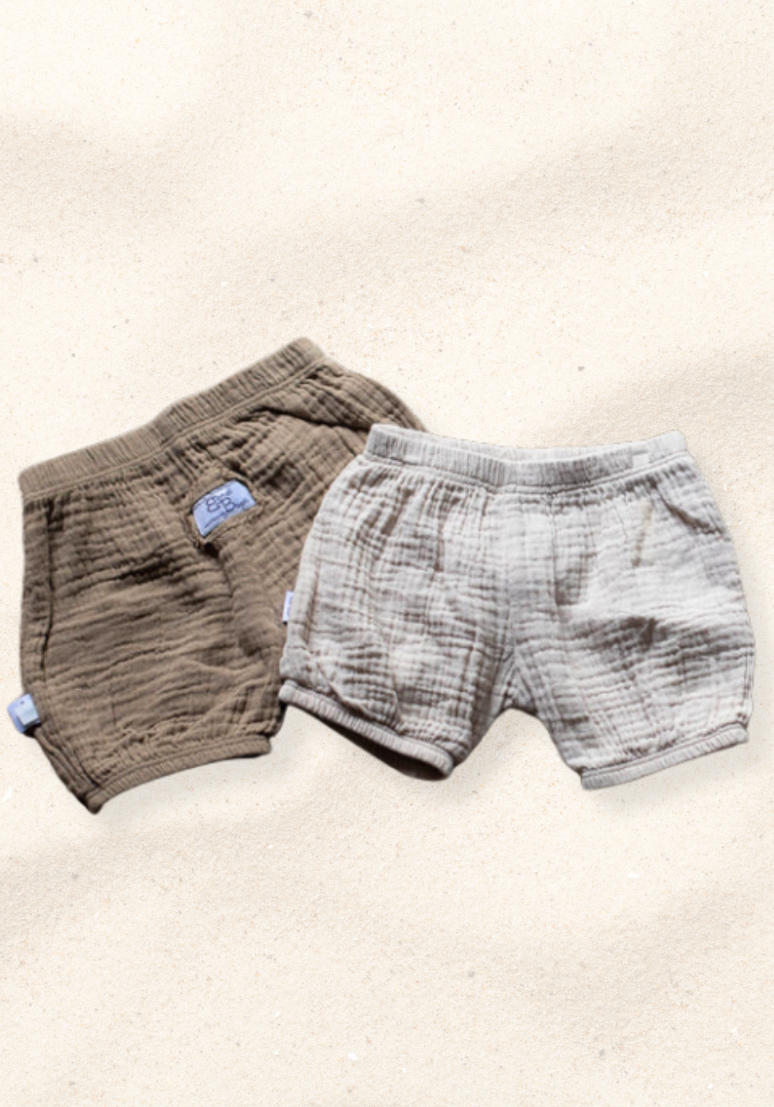 Mocha organic cotton baby bloomers with soft elastic waistband and leg openings, perfect for warm weather