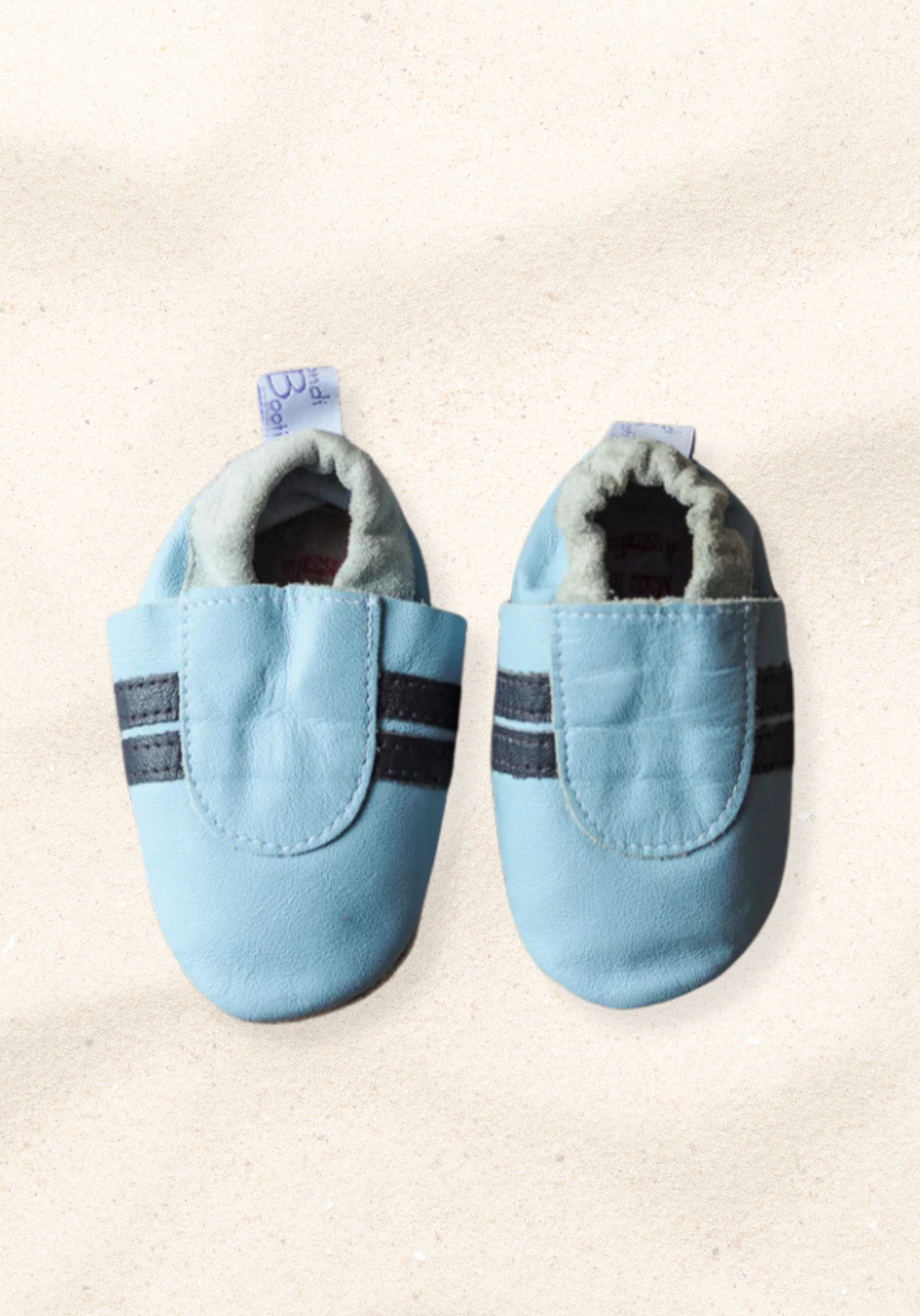 soft sole baby shoes in sky blue leather with black stripes and elastic opening