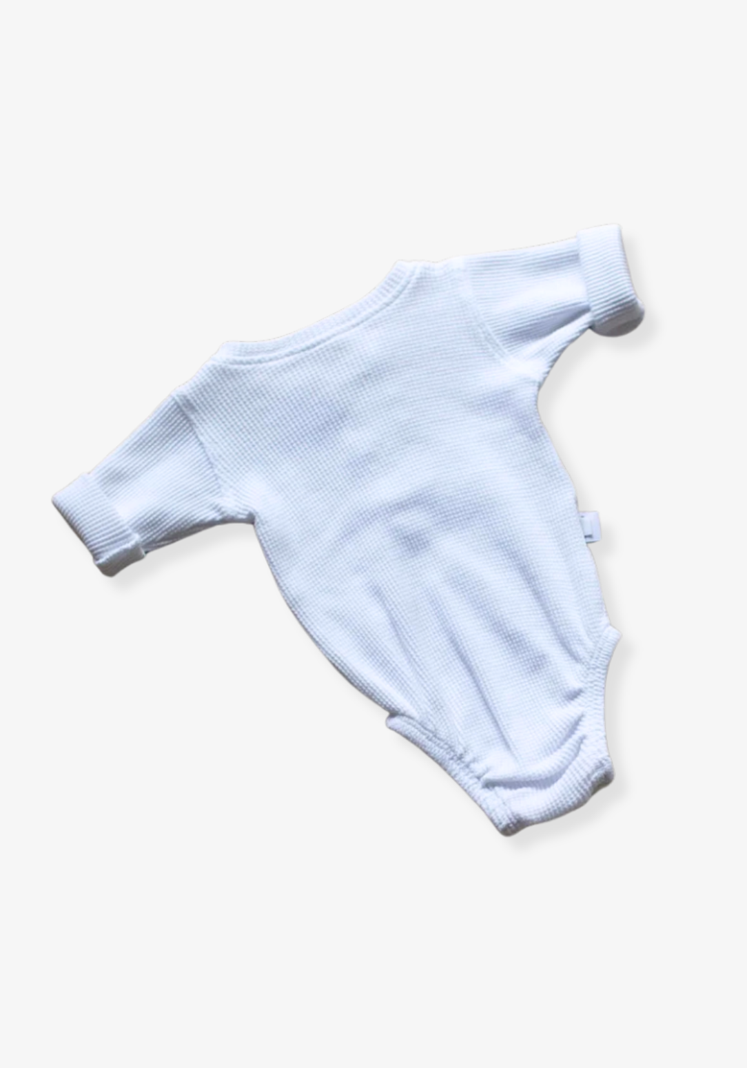 waffle knit long sleeve baby bodysuit with soft organic cotton texture and convenient snap buttons