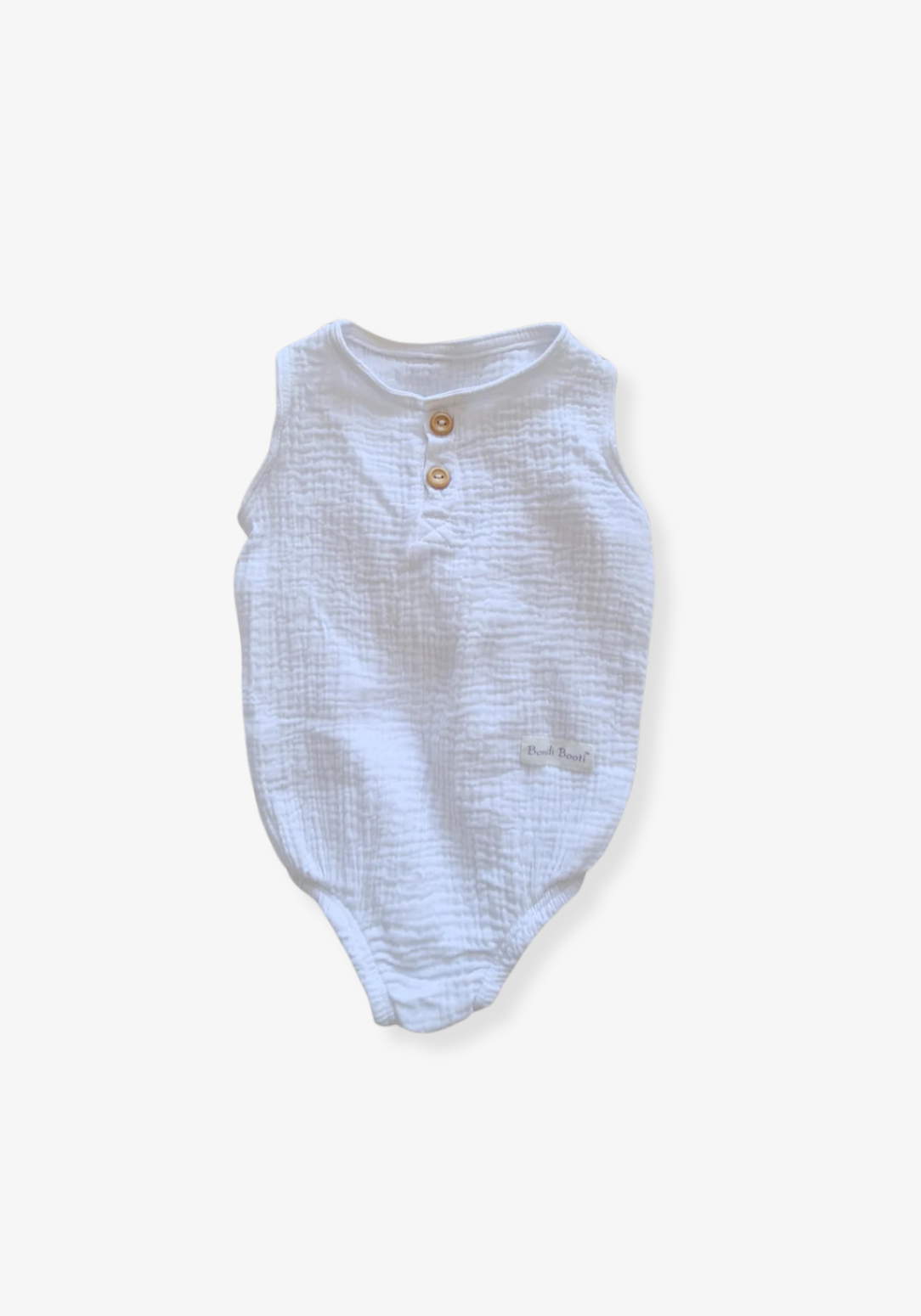 White organic cotton baby romper with three snap buttons and elasticised leg bands