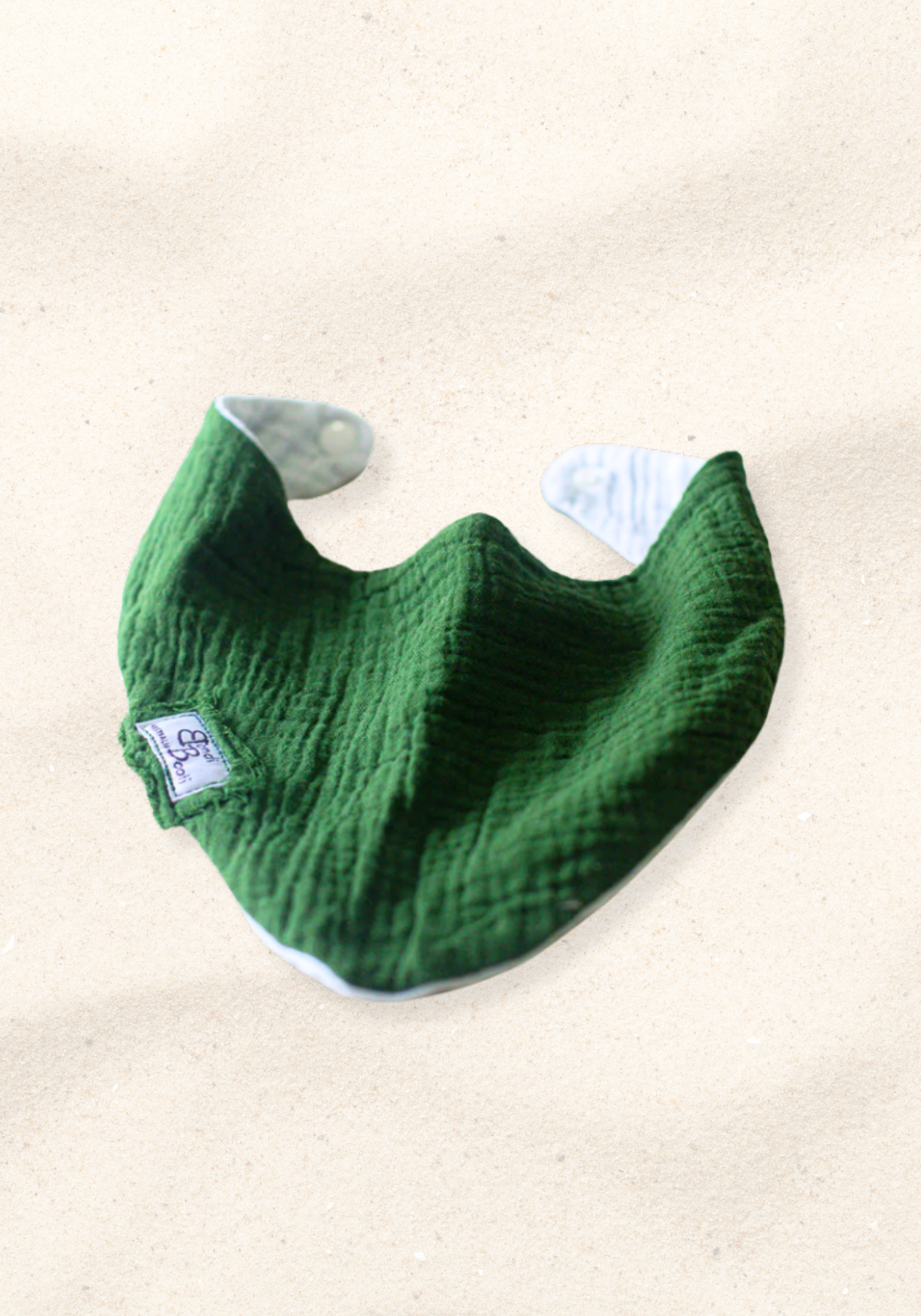 Deep green bandana-style baby bib made from soft organic cotton with absorbent inner lining.
