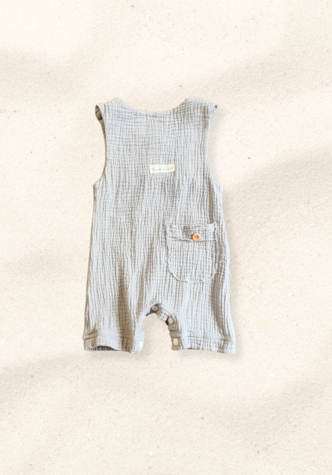 French grey organic cotton baby overall onesie with bottom snaps and wooden buttons. 