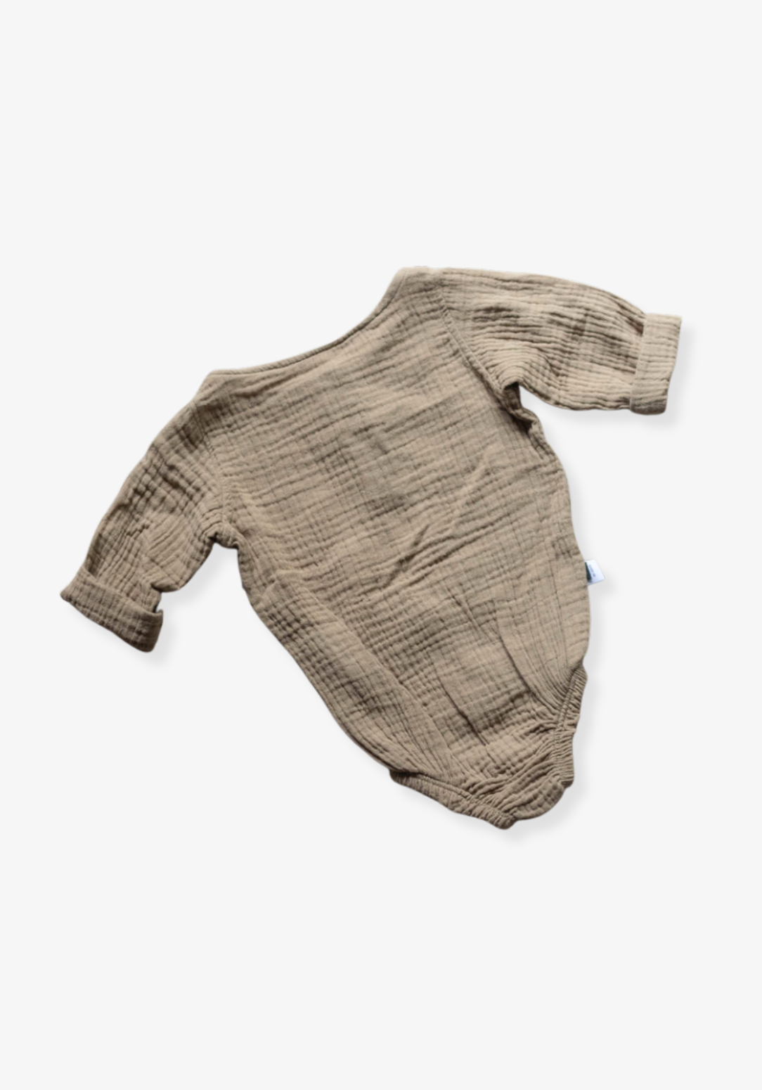 Long sleeve baby romper in mocha color crafted from organic cotton with snap closure and wood button details