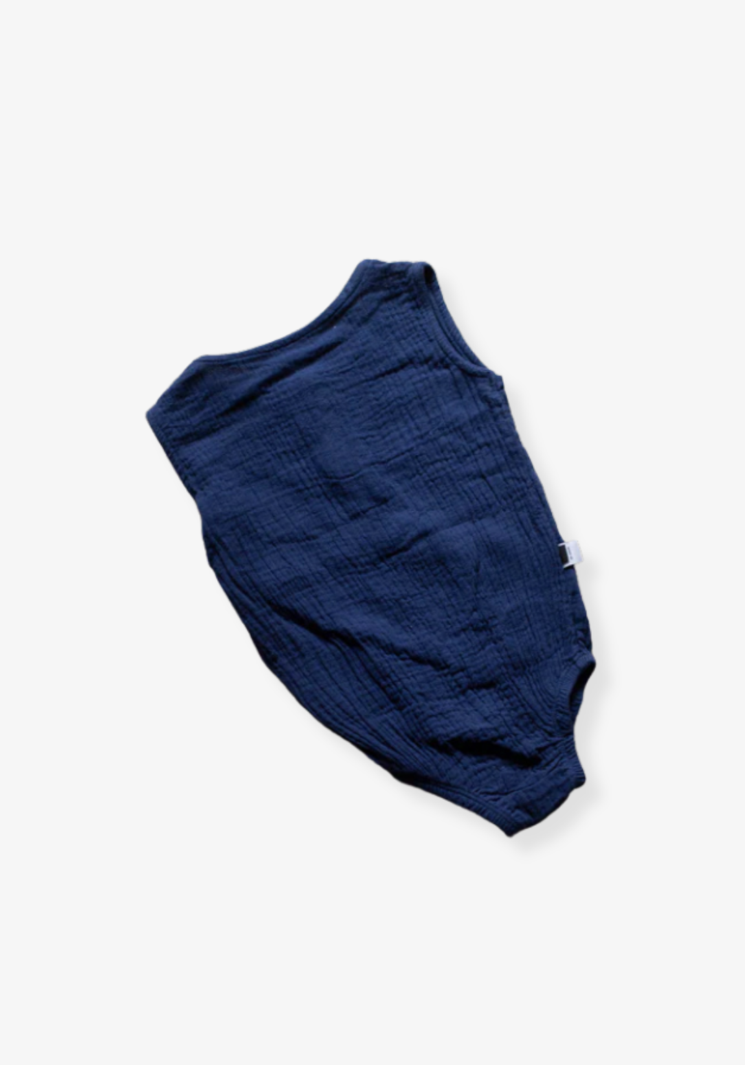 Navy short sleeve baby romper made from organic cotton with three snap buttons at the bottom and elasticised leg bands