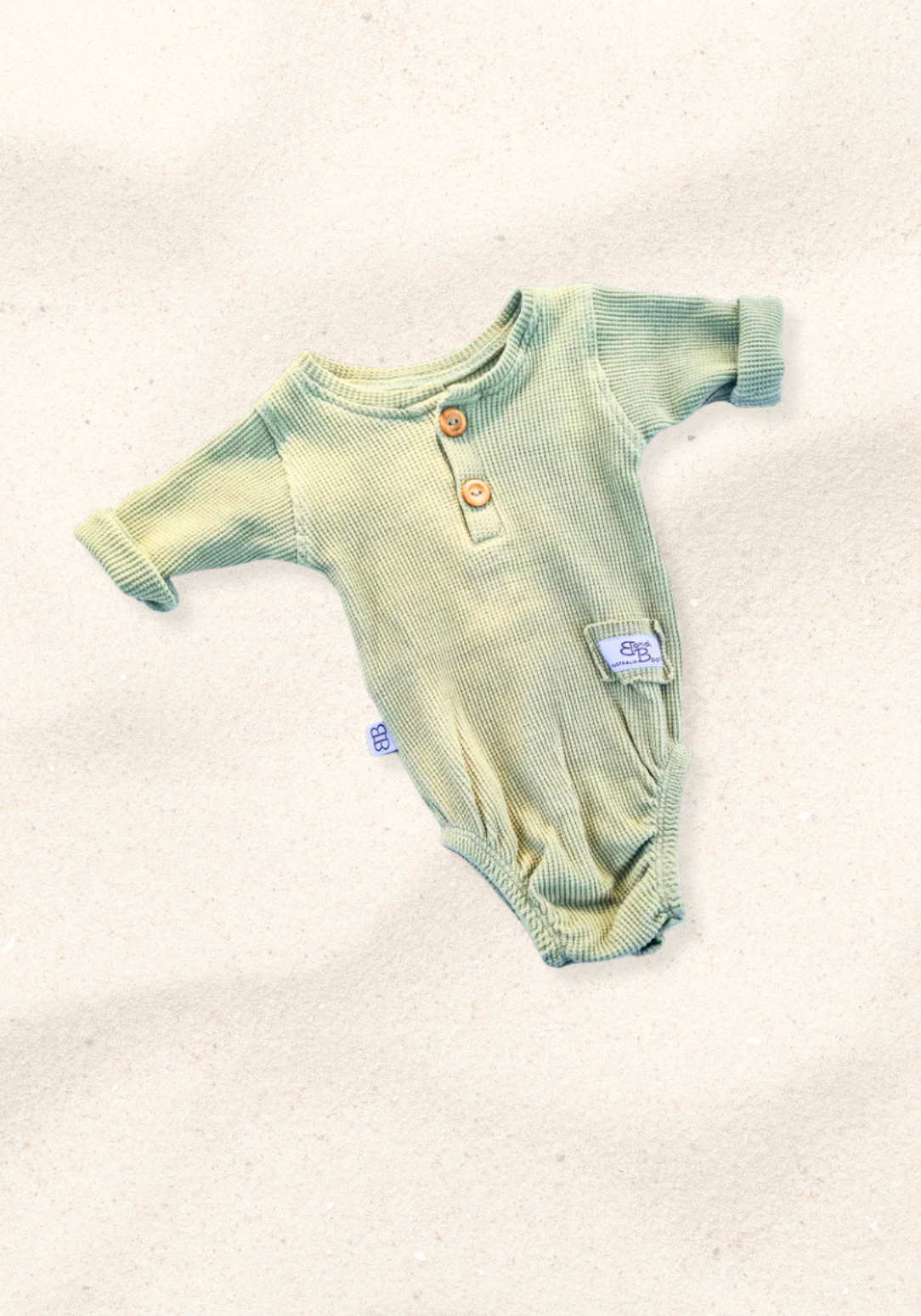 waffle knit long sleeve baby bodysuit with soft organic cotton texture and convenient snap buttons