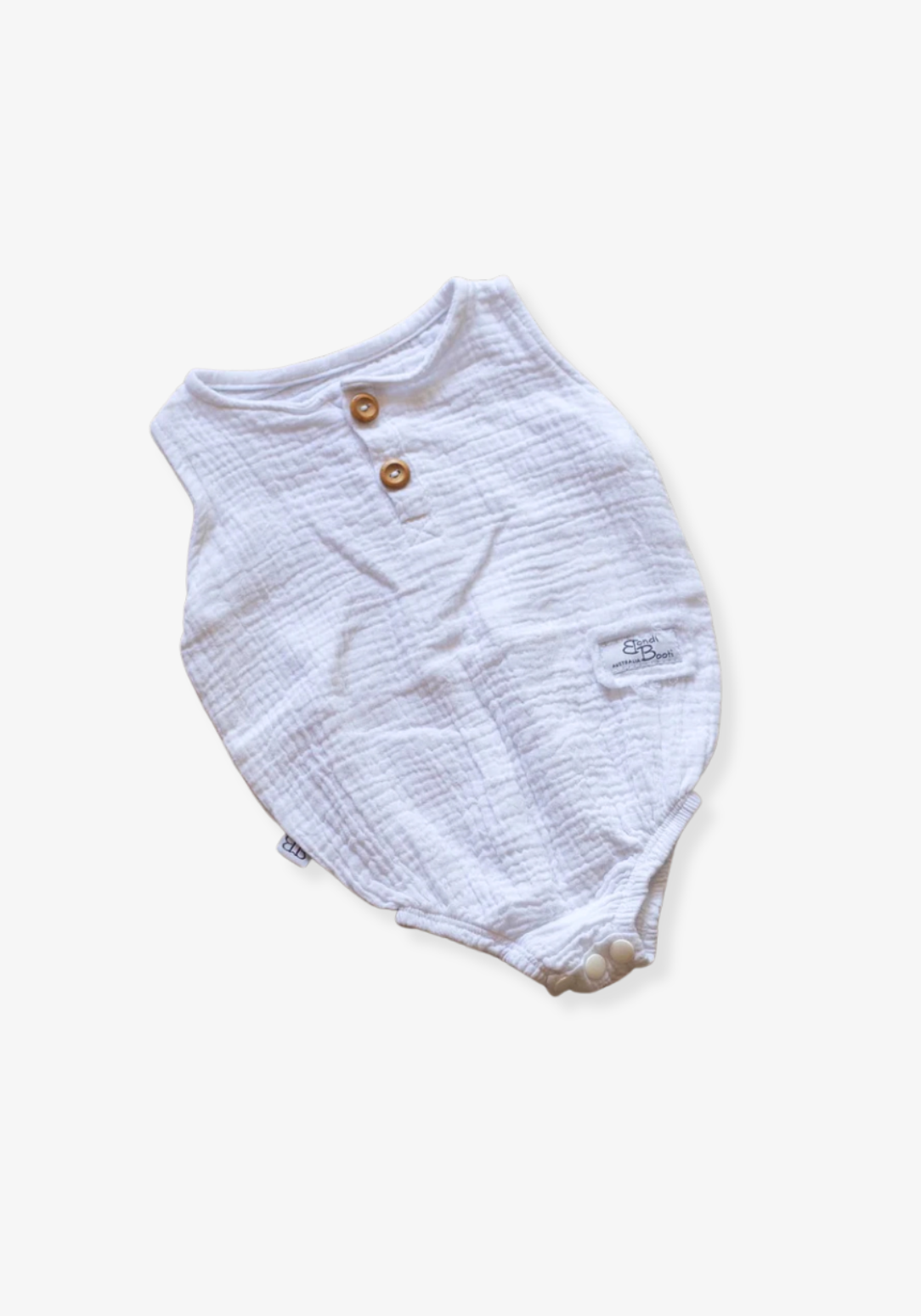 White organic cotton baby romper with three snap buttons and elasticised leg bands